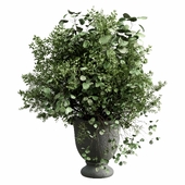 Bouquet green plant in gray concrete dirty vase 48