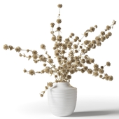 Dry twigs with balls in a vase