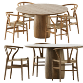 CH24 chairs by Carl Hansen and Son and Barrel Dining Table by Vanrossum
