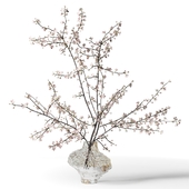 Flowering branches in a ribbed glass vase