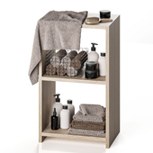 Cabinet with towels and bathroom decor