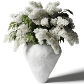 White lilac in a white vase - flower bouquet - flowers in a vase