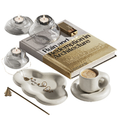 Decorative set with golden book, coffee and jewelry