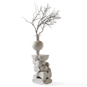 Re Jin Lee podium with branch in vase